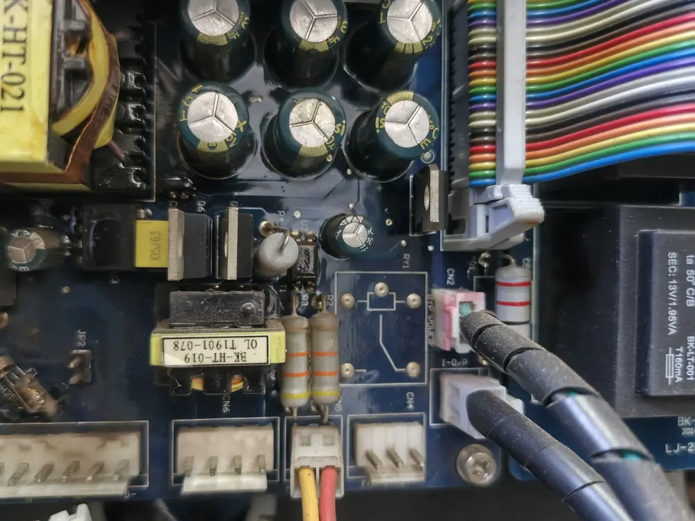 Power electronics board with capacitors and connectors